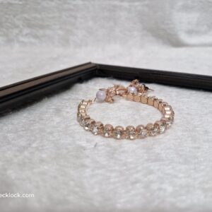 Elegant Rose Gold Hand Bracelet with Stone Embellishments - Image 3