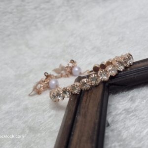 Elegant Rose Gold Hand Bracelet with Stone Embellishments - Image 1