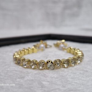 Elegant Gold-Tone Hand Bracelet with Stone Embellishments - Image 1